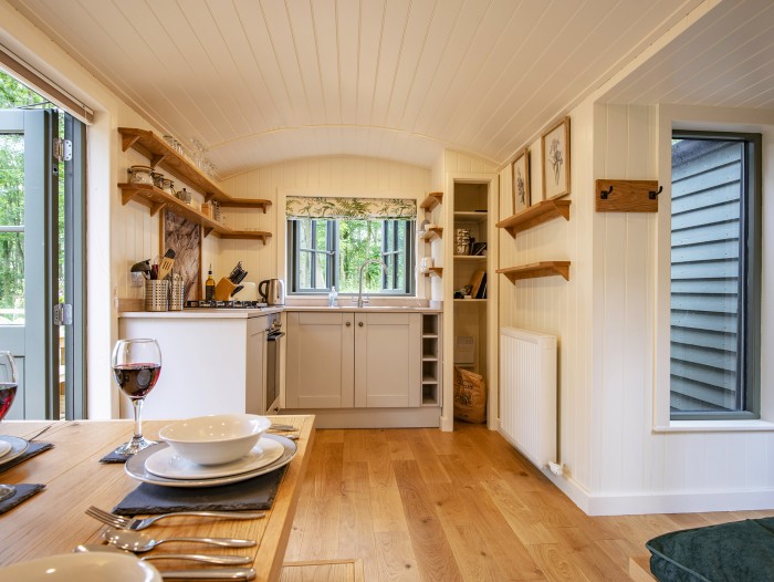 Escape to a serene cabin offering sweeping woodland and fellside views